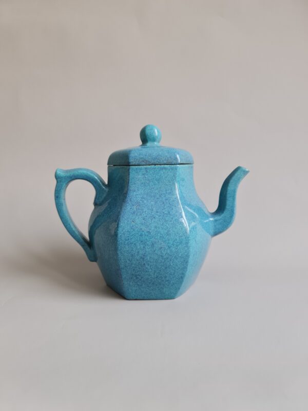 A Chinese Yixing clay teapot with a 'Robin's egg glaze' and a seal mark of Dan Ran Zhai