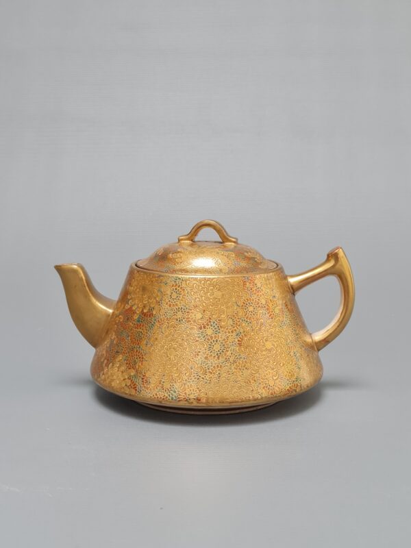 A Fine Japanese ceramic Satsuma teapot with rich floral decoration, marked Kōzan 幸山, Meiji period (1868-1912)